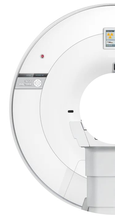 High-resolution detail of a mobile digital PET/CT scanner gantry, showcasing precision control interface and patient positioning platform used in advanced cardiac and oncology imaging.