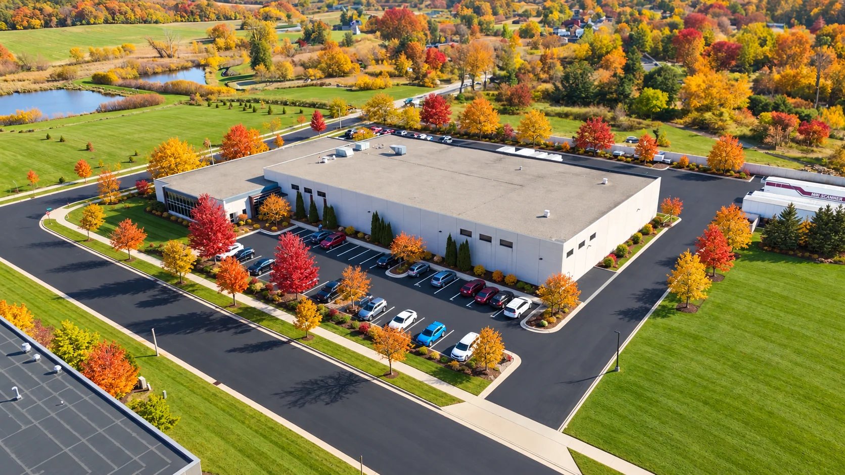 Shared Medical Services office aerial in autumn Aerial view of the Shared Medical Services office surrounded by autumn trees.