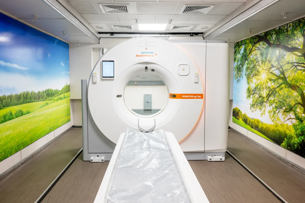 CT scanner and patient table inside an SMS mobile imaging unit.